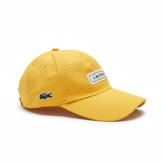 Шапка с козирка Lacoste