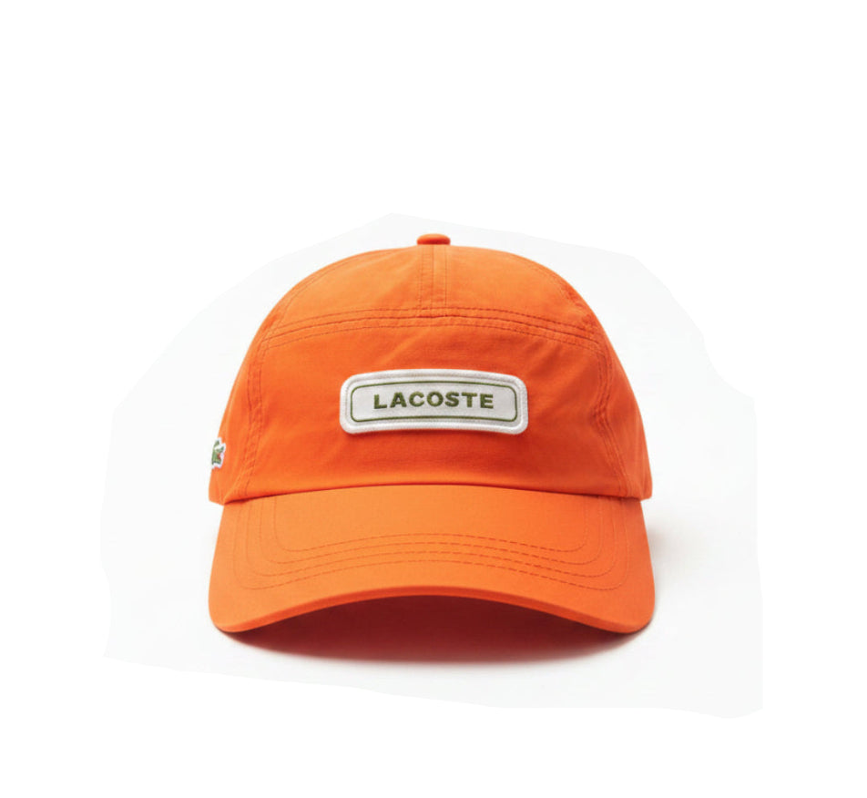Шапка с козирка Lacoste