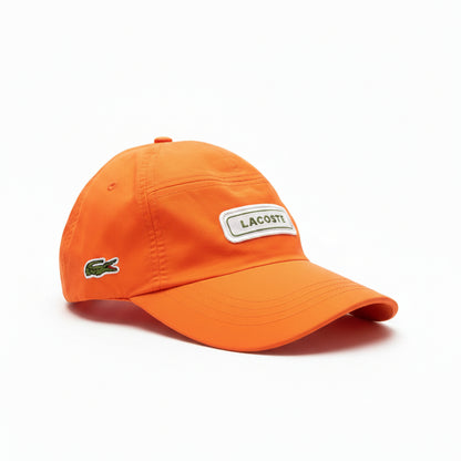 Шапка с козирка Lacoste