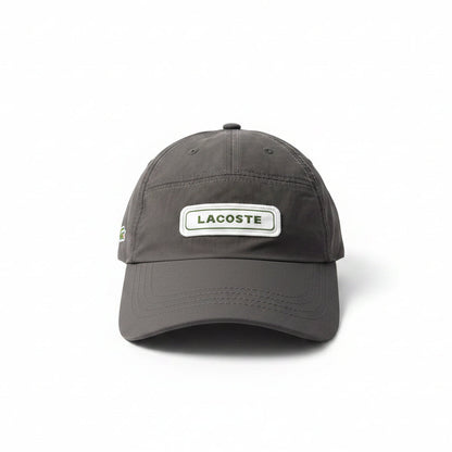 Шапка с козирка Lacoste