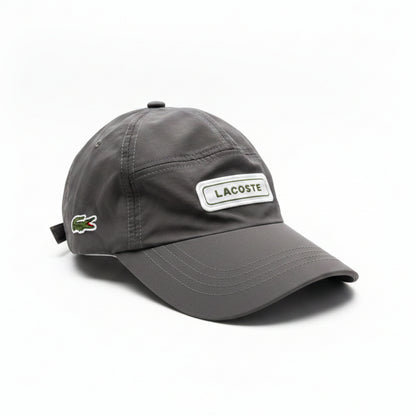 Шапка с козирка Lacoste