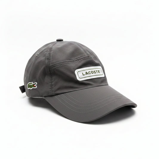 Шапка с козирка Lacoste